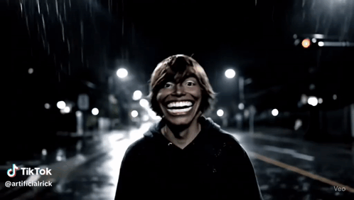 Smiling Man On Night Street GIF