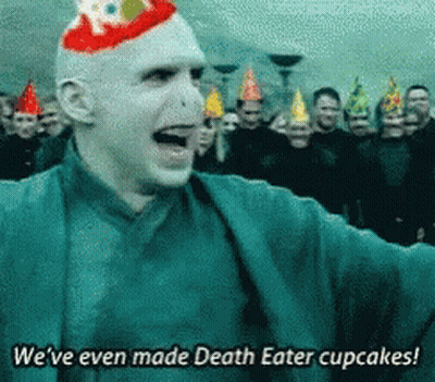 A Man With A Birthday Hat On His Head Says " We 'Ve Even Made Death Eater Cupcakes " GIF