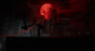 A Man With A Bloody Hand Is Reaching Out In The Dark GIF