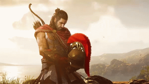 A Man With A Bow And Arrow Is Holding A Helmet In Front Of A Body Of Water GIF