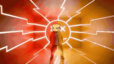 A Man With A Box On His Head Is Dancing In A Room GIF