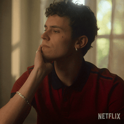 A Man With A Bracelet On His Wrist And A Netflix Logo On The Bottom GIF