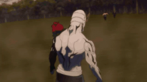 A Man With A Bun On His Head Is Standing Next To Another Man In A Black Shirt GIF