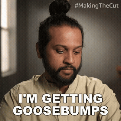 A Man With A Bun On His Head Says I 'M Getting Goosebumps GIF