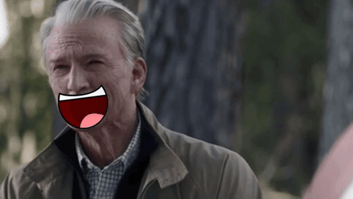A Man With A Cartoon Face On His Face GIF
