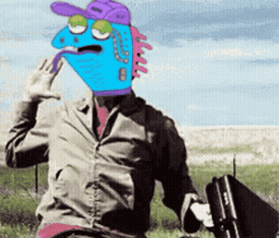 A Man With A Cartoon Face On His Head Holding A Suitcase GIF