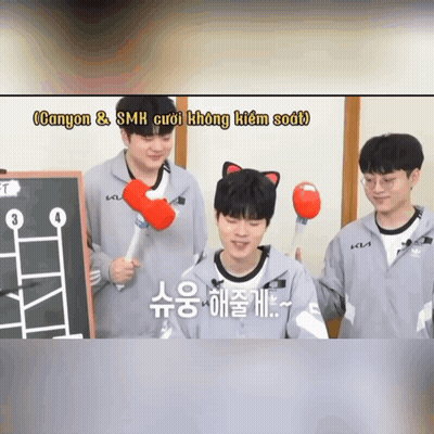 A Man With A Cat Ear On His Head Is Holding A Red Hammer In His Hand GIF