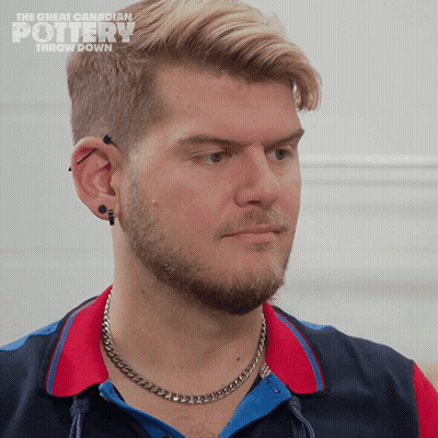 A Man With A Chain Around His Neck Is On The Great Canadian Pottery Throw Down Show GIF