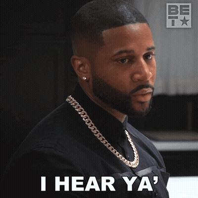 A Man With A Chain Around His Neck Is Saying I Hear Ya GIF