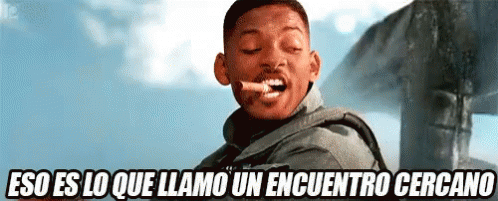 A Man With A Cigarette In His Mouth And The Words Eso Es Lo Que Llama Un Encuentro Cercano Below Him GIF