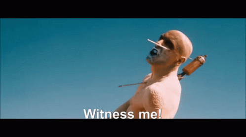 A Man With A Cigarette In His Mouth And The Words Witness Me GIF