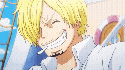 A Man With A Cigarette In His Mouth Is Smiling GIF