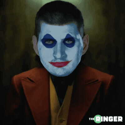 A Man With A Clown Face Painted On His Face With The Ringer Written Below Him GIF