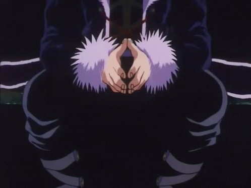A Man With A Cross On His Forehead Wears A Fur Coat GIF