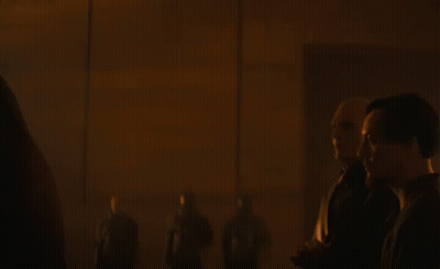 A Man With A Cross Tattoo On His Forehead GIF