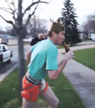 A Man With A Crown On His Head Is Drinking A Beer GIF