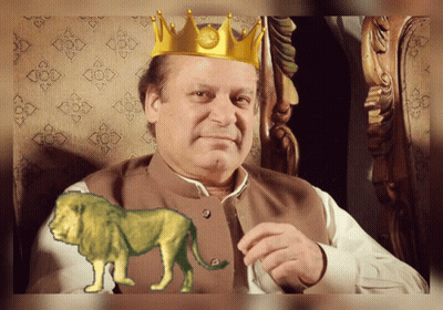 A Man With A Crown On His Head Sits Next To A Lion GIF
