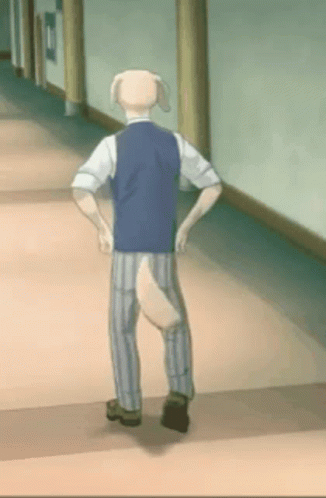 A Man With A Dog Tail Is Walking Down A Hallway . GIF
