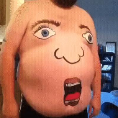 A Man With A Face Painted On His Belly GIF