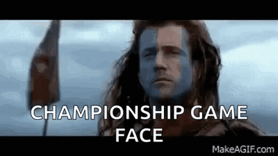 A Man With A Flag On His Face And The Words `` Championship Game Face '' Written Above Him . GIF