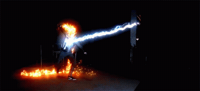 A Man With A Flaming Head Is Standing In Front Of A Ghost GIF