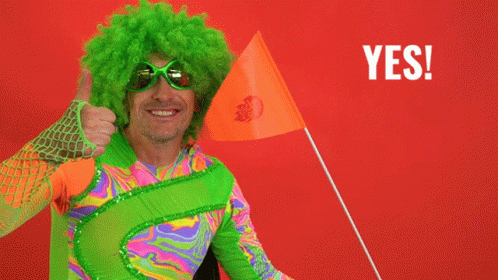 A Man With A Green Wig And Sunglasses Holds An Orange Flag And Says " Maybe " GIF