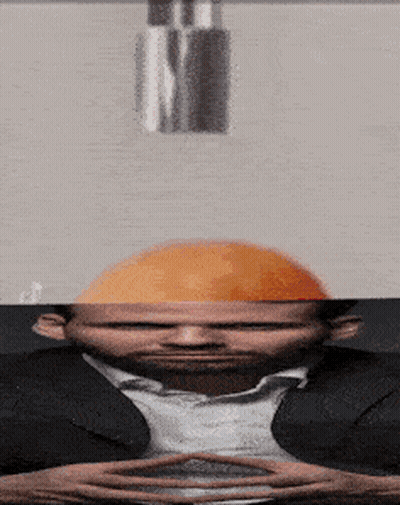 A Man With A Hard Hat On His Head Looks At Something GIF