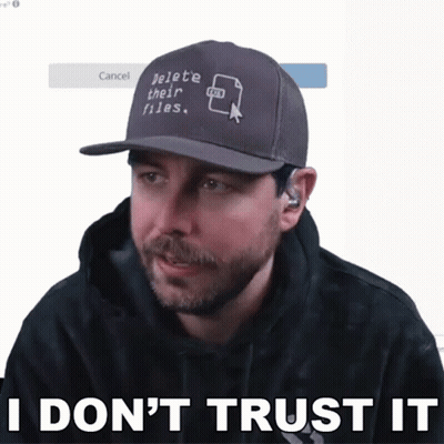 A Man With A Hat That Says Delete Their Files GIF