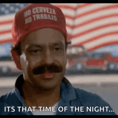 A Man With A Hat That Says No Cerveza No Trabajo On It GIF
