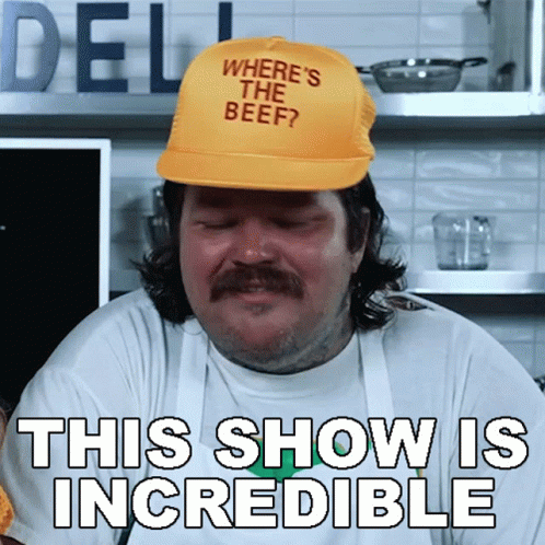 A Man With A Hat That Says Where 'S The Beef GIF