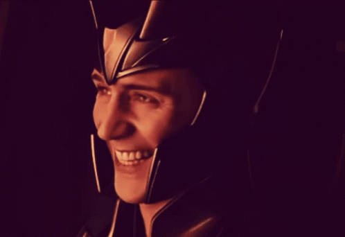 A Man With A Helmet On His Head Is Smiling GIF
