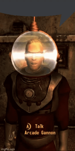 A Man With A Helmet On His Head Is Talking To Arcade Gannon GIF