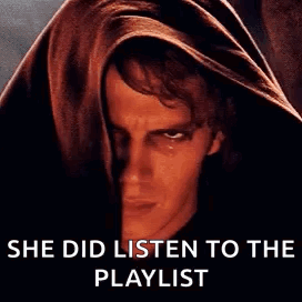 A Man With A Hood On His Head And The Words `` She Did Listen To The Playlist '' Written Below Him . GIF