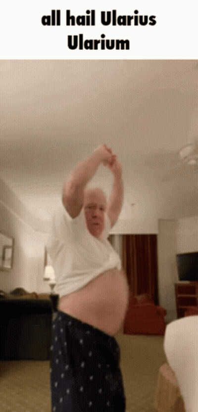 A Man With A Huge Belly Is Standing In A Room With The Words All Hail Ularius Ularium GIF