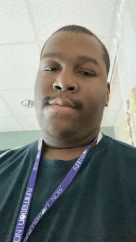 Man Wearing Lanyard Saying Animation Now GIF