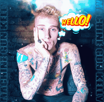 A Man With A Lot Of Tattoos Says Hello In A Comic Bubble GIF