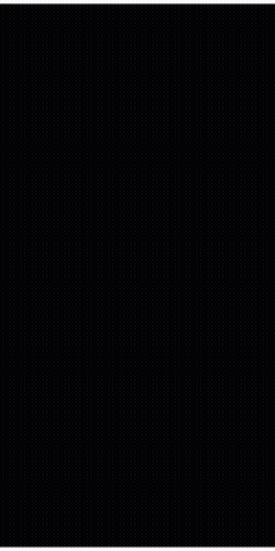 A Man With A Mask On His Face Is Walking In A Dark Room GIF