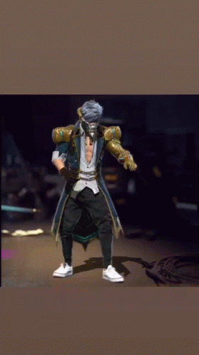 A Man With A Mask On His Face Is Wearing A Blue And Gold Outfit GIF
