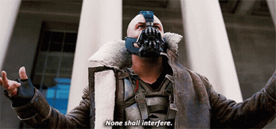 A Man With A Mask On His Face Says " None Shall Interfere " GIF