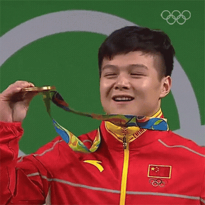a man with a medal around his neck that says china on it