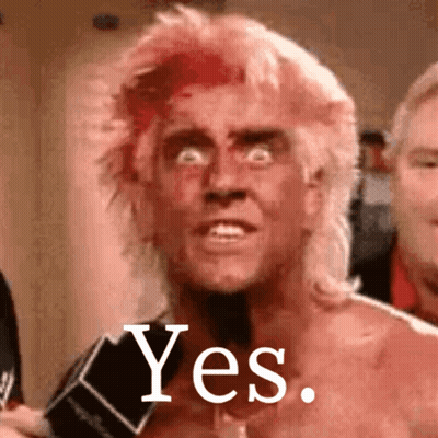 A Man With A Microphone In His Hand Says Yes GIF