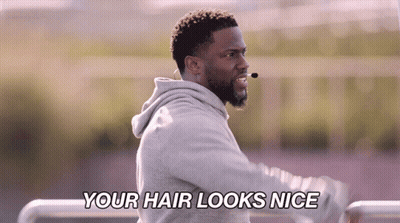 A Man With A Microphone On His Head Says " Your Hair Looks Nice " GIF
