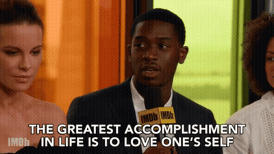 A Man With A Microphone That Says Imdb On It GIF