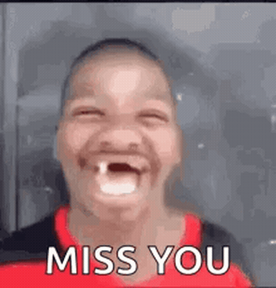 A Man With A Missing Tooth Is Making A Funny Face And Saying `` I Miss You '' . GIF