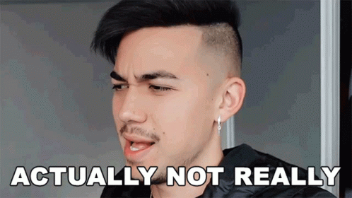 A Man With A Mohawk And Earrings Says " Actually Not Really " In Front Of His Face GIF