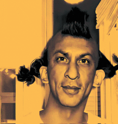 A Man With A Mohawk Looks At The Camera With A Yellow Background GIF