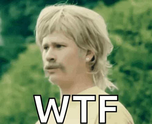 A Man With A Mullet And A Mustache Has The Word Wtf Written On His Face GIF