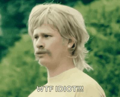 A Man With A Mullet And Mustache Is Saying Wtf Idiot !!! GIF