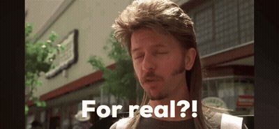 A Man With A Mullet Says " For Real " In Front Of A Building GIF