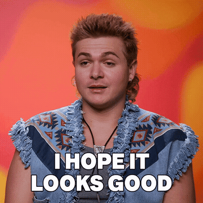 A Man With A Mullet Says " I Hope It Looks Good " While Wearing A Blue Vest GIF